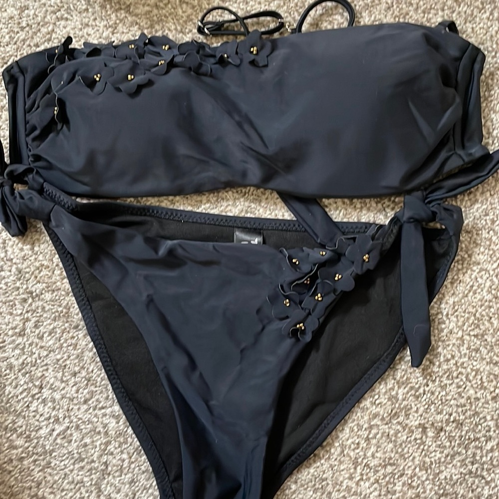 Rae 2 piece swimsuit. This was purchased  in France. It’s much cuter up close.